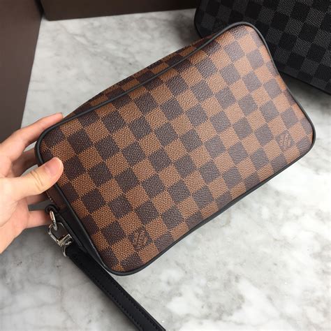 lv pouch clutch|Lv clutch bags men's.